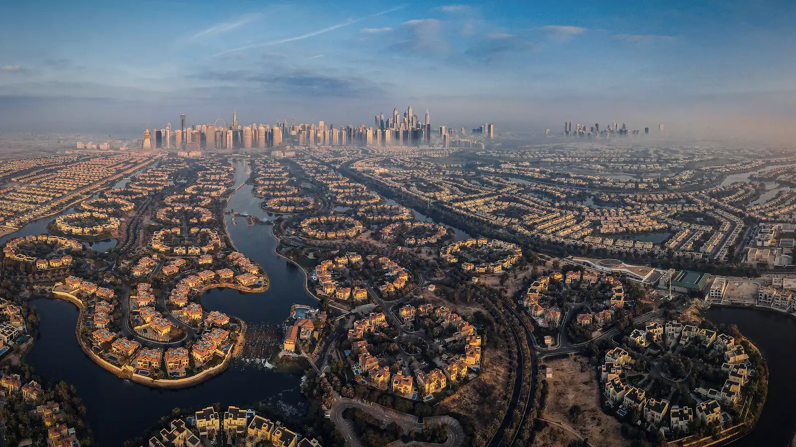 Aerial view of Jumeirah Islands villas at sunset